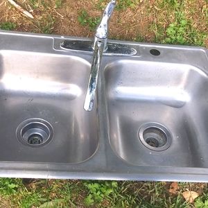 Two stainless steel sinks